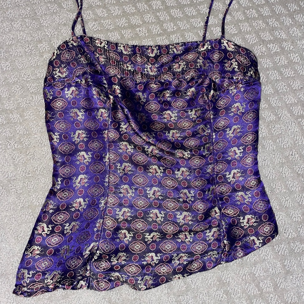 a-symmetrical purple fitted tank